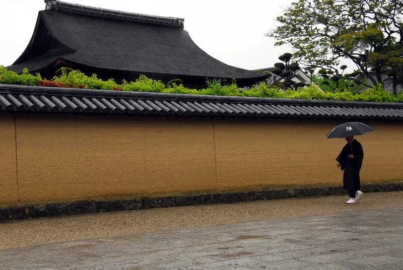 Commuters stranded at a flooded Chiba train station