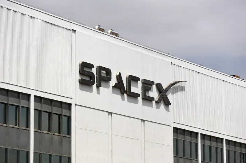 Nasdaq board showing SpaceX shares falling