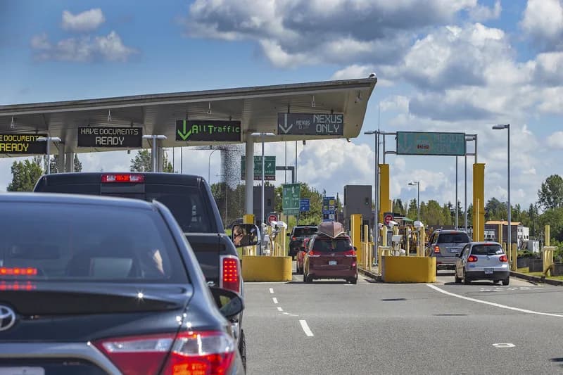 Cargo trucks at a US-Canada border checkpoint